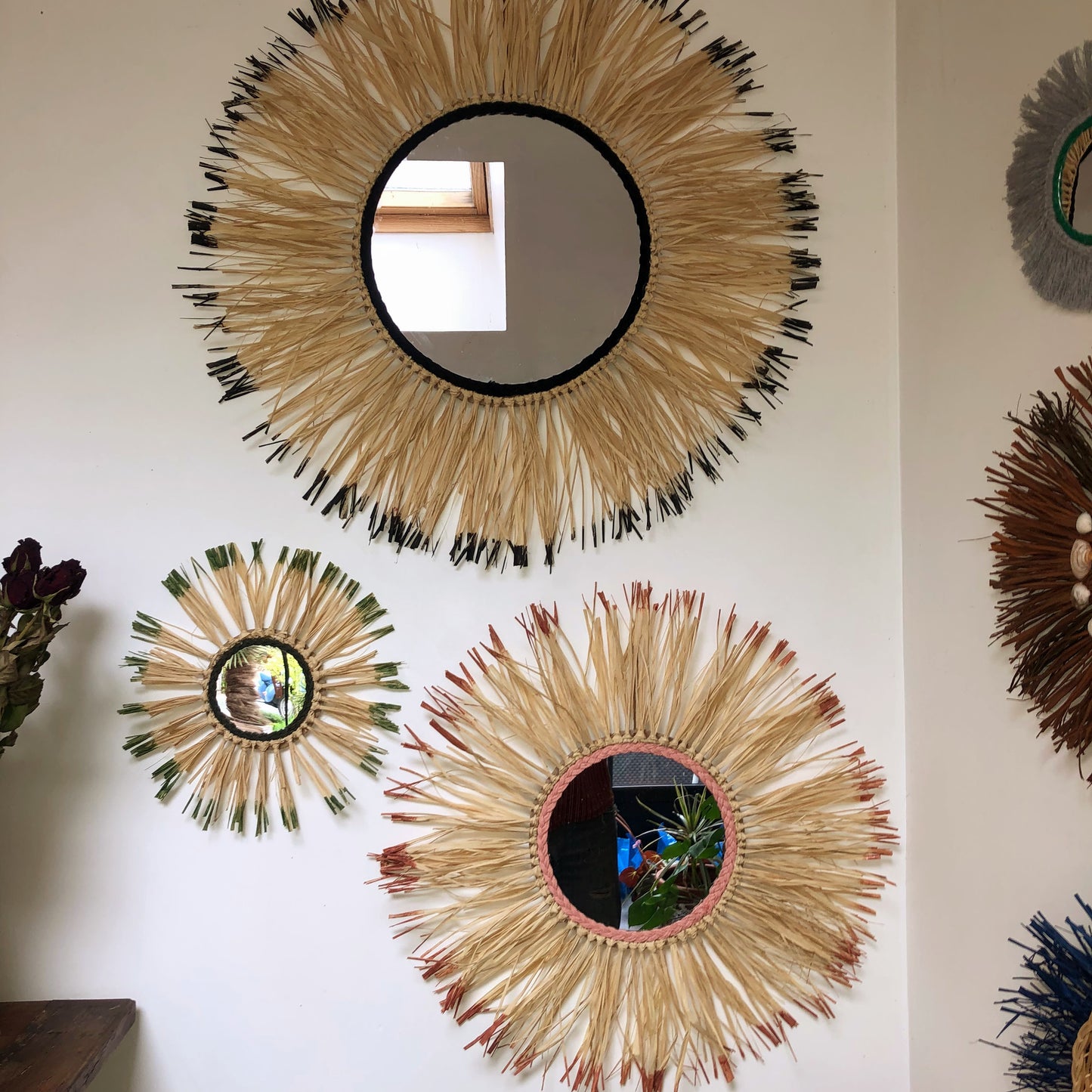 Large raffia mirror, the black sun