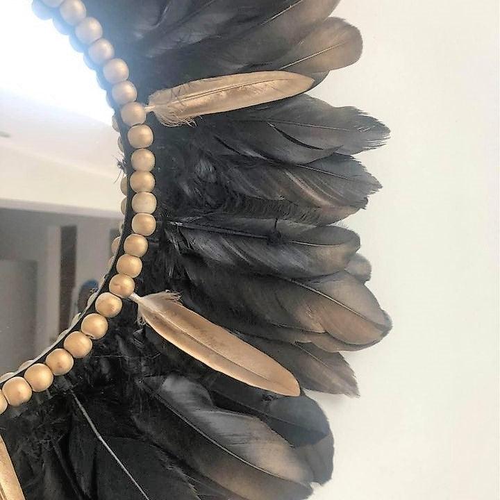 Miroir en plumes noires ou blanches avec dorures