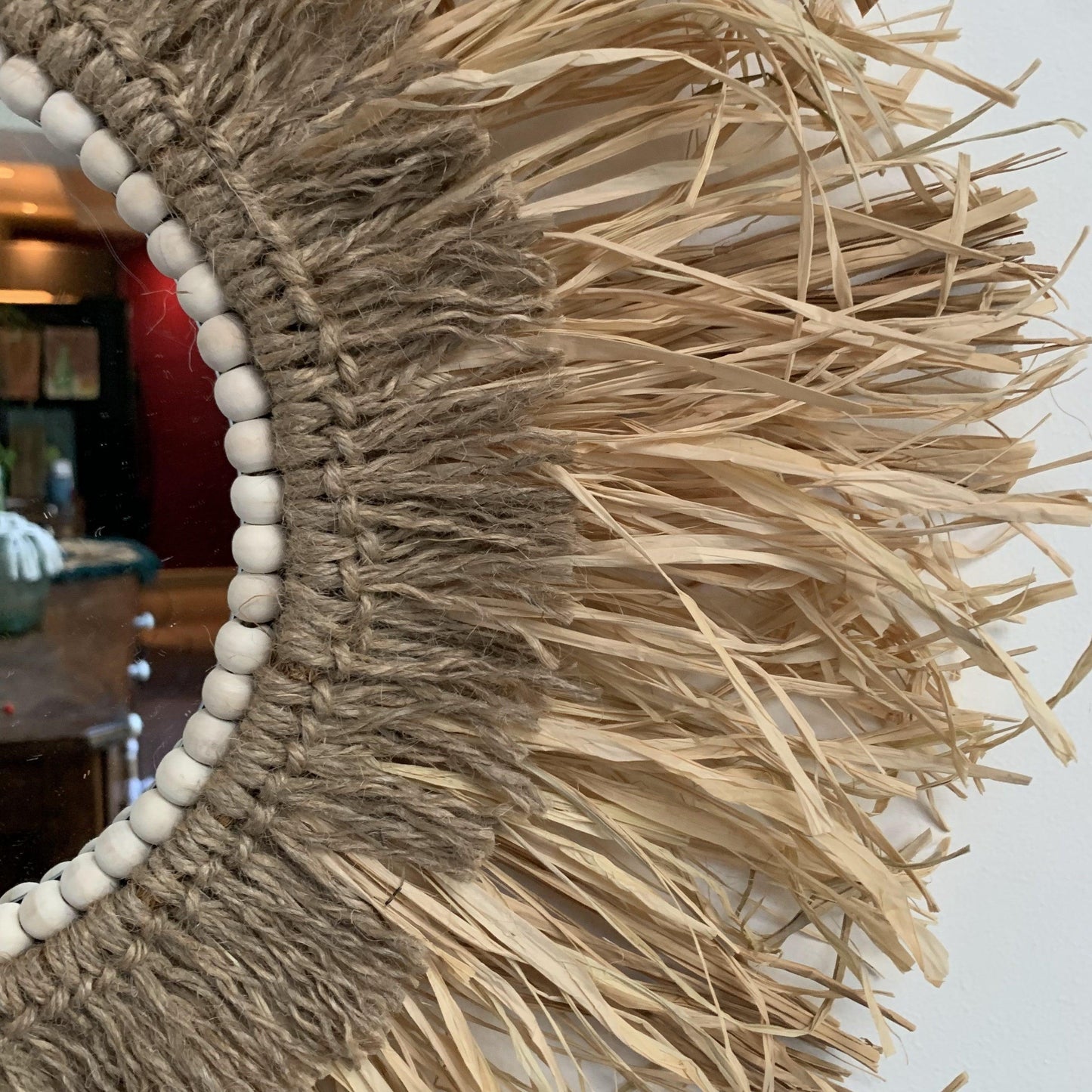 Miroir en raphia et cordages naturels