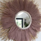 Decorative wall mirror in raffia and feathers