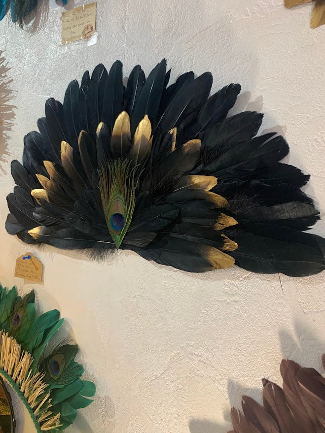 Large decorative fan made of natural feathers