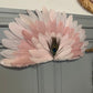 Large decorative fan made of natural feathers