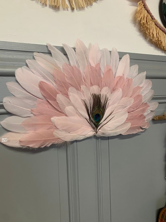 Large decorative fan made of natural feathers