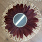 Decorative wall mirror in raffia and "daisy" feathers