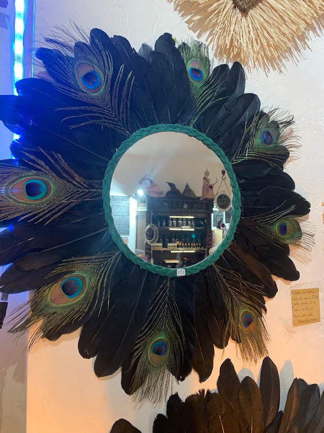 Black wall mirror with peacock feathers, 50cm