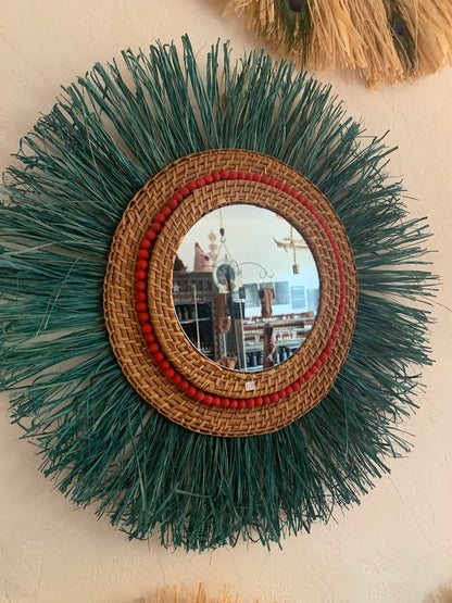 Mirror made of ultramarine blue raffia, rattan and raw wooden beads