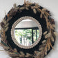 Miroir en macramé noir et fleurs séchées
