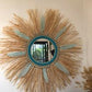 Miroir en raphia naturel avec plumes et perles turquoises