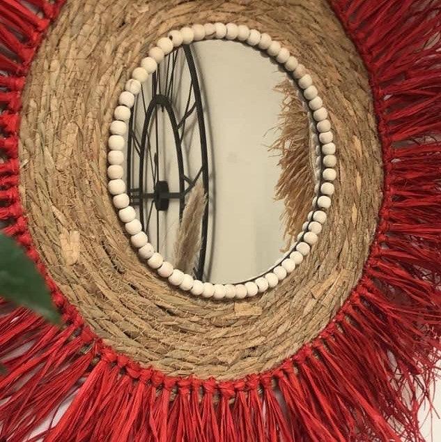 Red raffia mirror on braided base